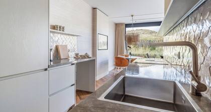 Luxury and atmosphere with a garden and dune views