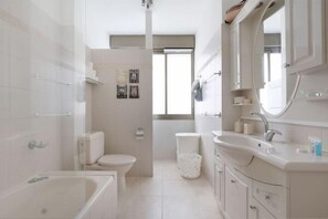 Iron/ironing board - Cozy 3BR Apt w Big Windows 5 Min Walk From Beach (Tel Aviv)