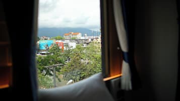 Habitación Deluxe con 2 camas individuales | Caja fuerte, cortinas opacas, sistema de insonorización y wifi gratis