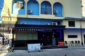 A building with a sign reading 'KALA BAR' and a covered entrance with a black awning. - Rustic Comfort Zone (Pattaya)