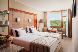 Standard Double Room, Balcony, River View | In-room safe, desk, blackout drapes, free WiFi