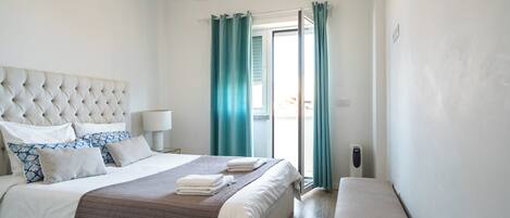 2 عدّة غرف نوم ومكواة/لوح كي وواي فاي مجانًا وملاءات أسرّة