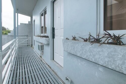 RedDoorz Premium @ THE GRAND PENINSULA SUITES