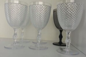 Three clear glass goblets with stemmed bases on a flat surface. - Ikebukuro No`3 (Tokyo)