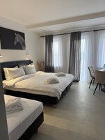 Standard Triple Room | Desk, laptop workspace, free WiFi