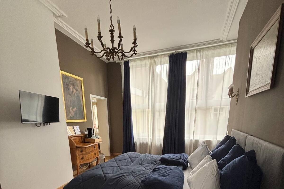 Chambre Triple Confort, vue cour intérieure | Lits bébé, Wi-Fi gratuit