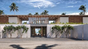 A modern building with a flat roof, large windows, and a covered entrance. - Nyne Hotels Anugrah - Bentota (Bentota)