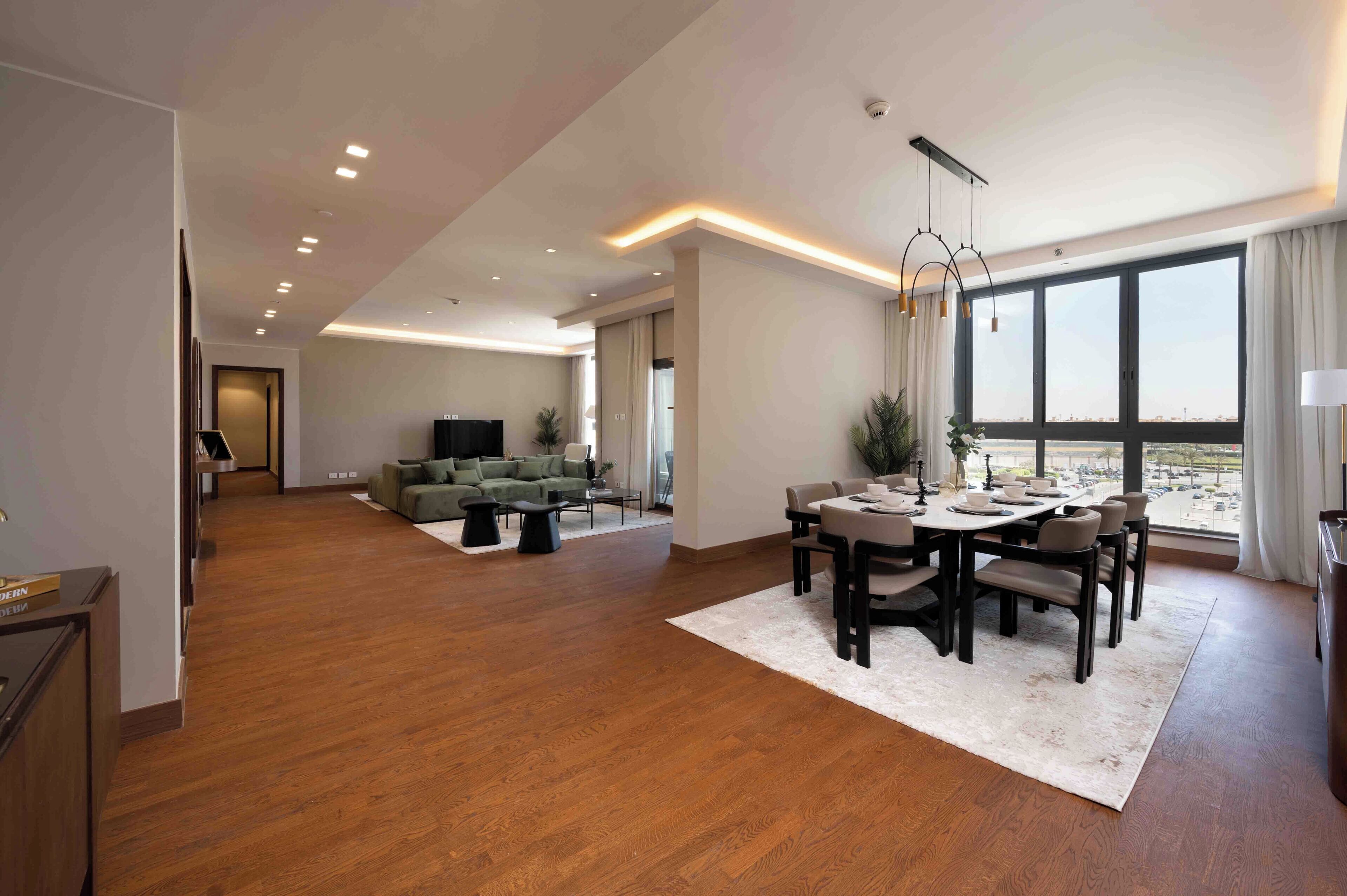 Comfort Apartment, City View | Living area | 64-inch Smart TV with satellite channels