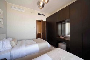 Economy Apartment, City View | Desk, laptop workspace, iron/ironing board