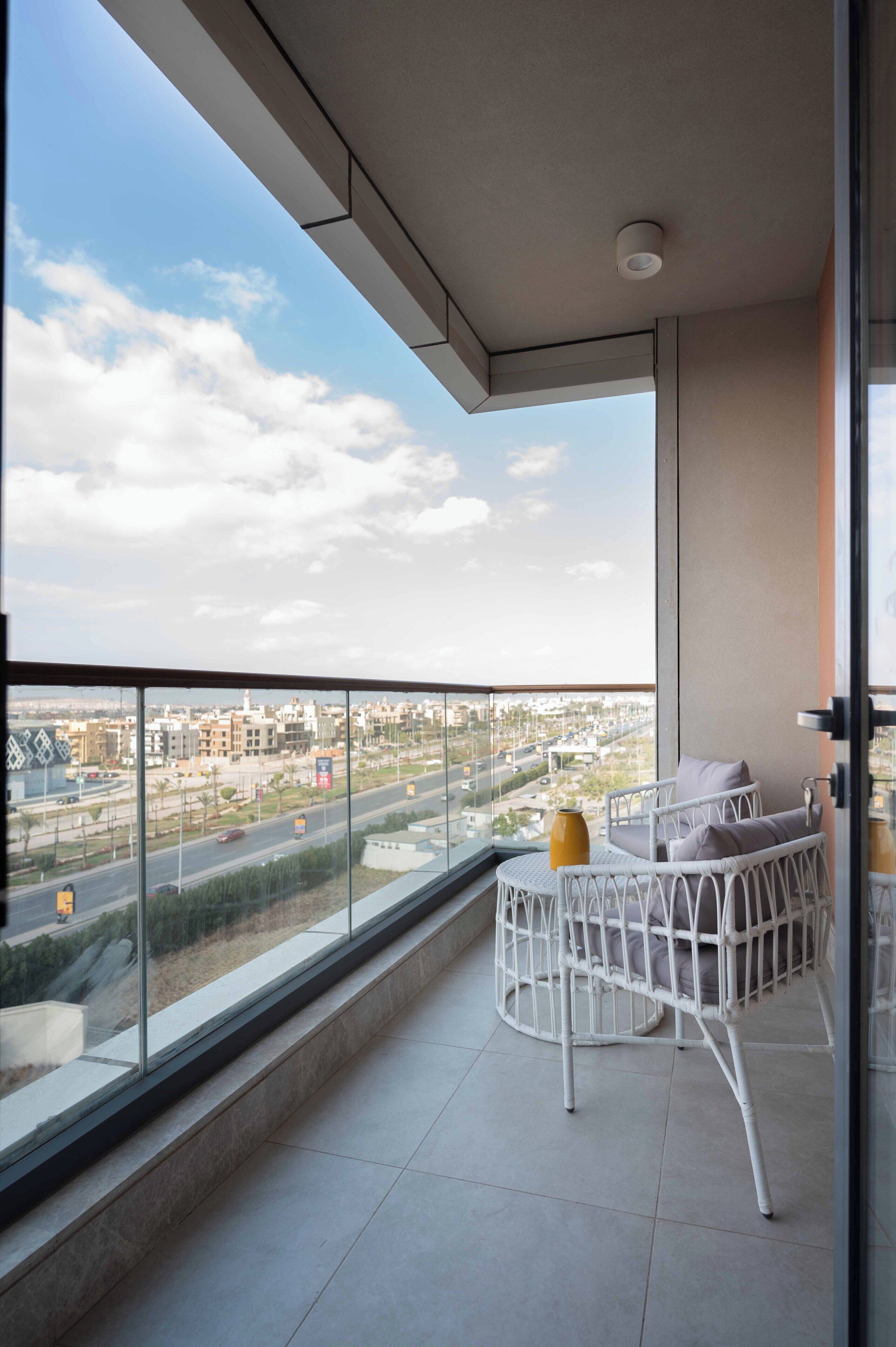 Luxury Apartment, City View | Living area | 64-inch Smart TV with satellite channels