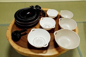 A wooden tray with various kitchen utensils and bowls. - Kamado and Tsuboyunoyado Osaka Minami (Osaka)