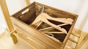 A wooden storage box with multiple wooden hangers inside. - Vacation Stay Fushimiinari (Kyoto)