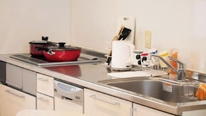 A kitchen with a stove, sink, and various utensils. - Vacation Stay Fushimiinari (Kyoto)