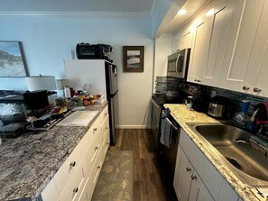 Fridge, microwave, oven, dishwasher - Sassy Studio Condo in Great Central Island Location (Marco Island)