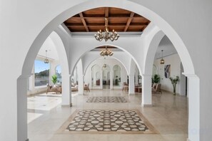 A spacious interior with arched ceilings, a patterned floor, and a chandelier. - Albatros Makadi Resort - 24 HRS All Inclusive (Hurghada)