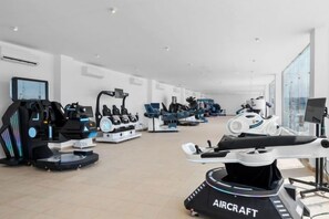A gym with various exercise equipment, including treadmills and stationary bikes. - Albatros Makadi Resort - 24 HRS All Inclusive (Hurghada)