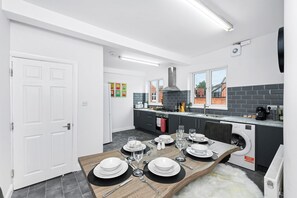 Apartment, 3 Bedrooms | Private kitchen | Full-size fridge, microwave, oven, stovetop