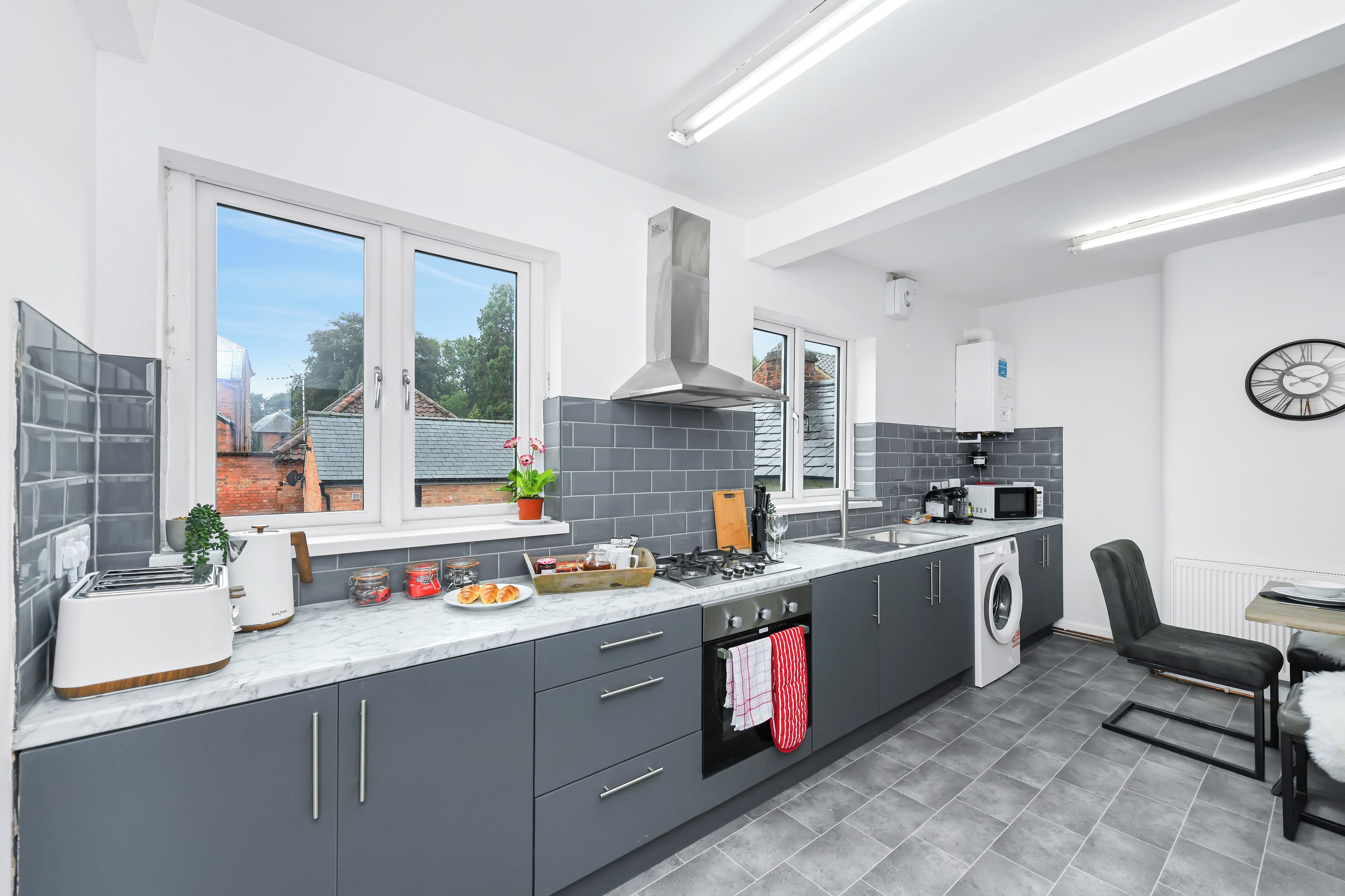 Apartment, 3 Bedrooms | Private kitchen | Full-size fridge, microwave, oven, stovetop