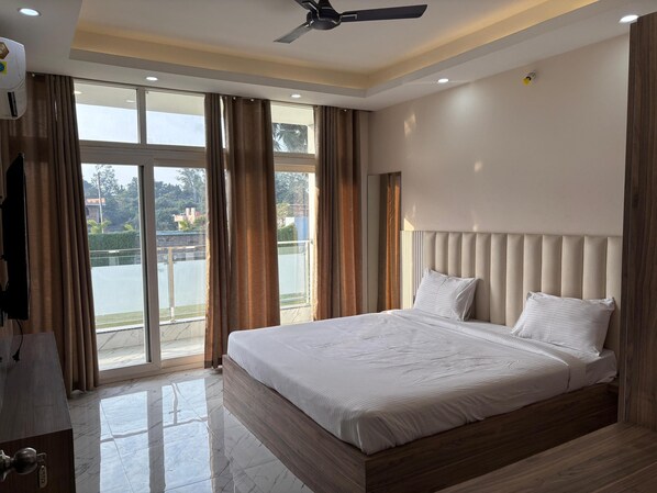 Deluxe Double Room, Balcony, Garden View | Garden view
