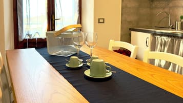 Family Apartment, Balcony, Garden View | Private kitchen | Full-sized fridge, oven, stovetop, high chair
