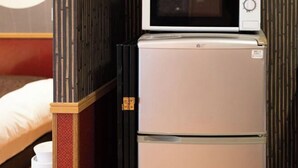A compact kitchenette with a microwave and refrigerator. - Prosupa 5th #501 (Nagoya)