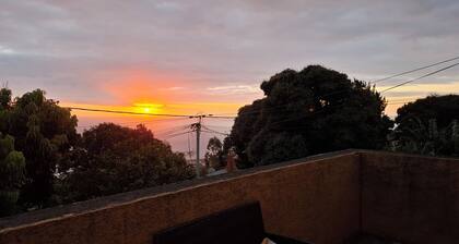 Maison face au soleil