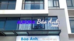 A hotel sign with "AURORA Bảo Anh Hotel" and "Bảo Anh" written in Vietnamese. - Aurora Bao Anh Hotel (Binh Kien)