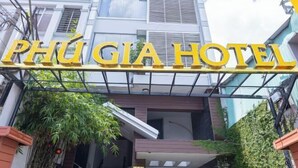 The entrance to Phú Gia Hotel with a prominent sign. - Phu Gia 113 Nguyen Thi Thap (Ho Chi Minh City)