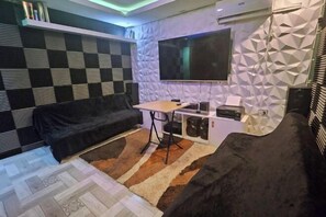 Living area - Natural Haven w/ Netflix,Videoke & Alfresco Dining (Dasmarinas)