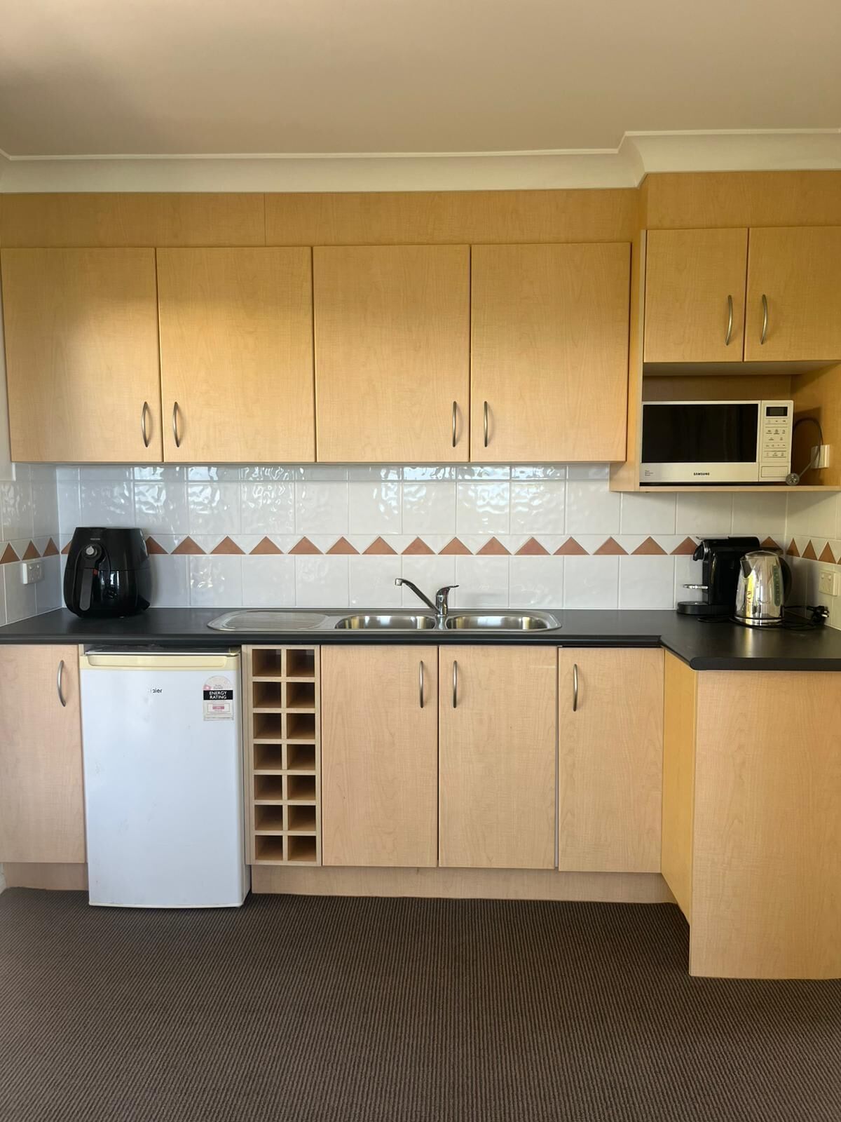 Fridge, microwave, coffee/tea maker, toaster