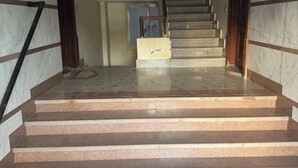 A staircase with marble steps leading to a landing. - Jamila Residential Apartment (Cairo)