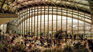 A spacious atrium with a high ceiling, large windows, and abundant indoor plants. - Eldon Chambers Pod 7 by City Living London (London)