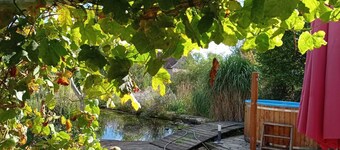 Cozy vacation home with swimming pond and large garden