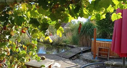 Cozy vacation home with swimming pond and large garden