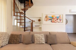 Apartment, 3 Bedrooms, Garden Area | Living area | 30-inch TV with satellite channels