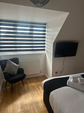Desk, iron/ironing board, travel crib, WiFi