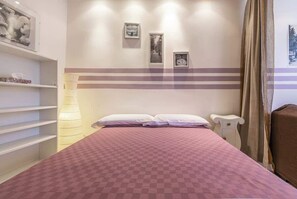 1 chambre, fer et planche à repasser, Wi-Fi gratuit, draps fournis