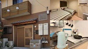 A hotel room with a balcony, a kitchen with a kettle, and a dining area with a table and chairs. - Shikai Family (101) (Osaka)