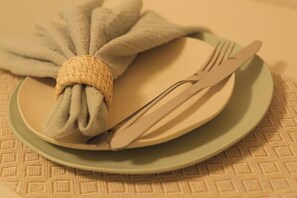 A plate with a folded napkin and cutlery. - Sumire 102 (Tokyo)