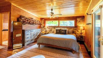 Master bedroom with attached full bathroom and walkout patio