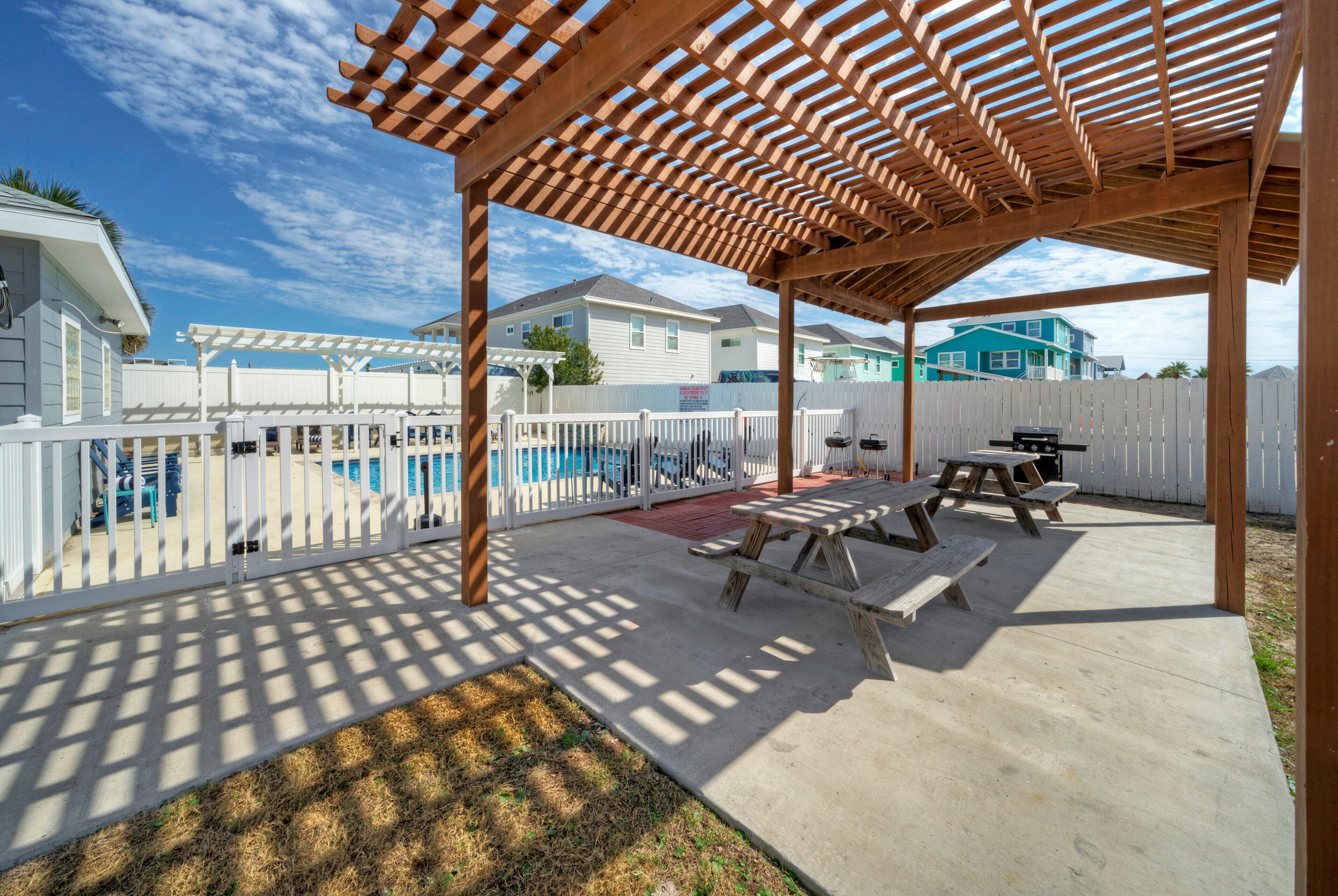 Grill with a view of the pool.