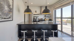 Coffee/tea maker, microwave, oven, stovetop - Premier Four-Bedroom Suite + Balcony | The Carter (Nashville)