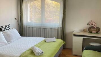 Desk, iron/ironing board, rollaway beds, bed sheets