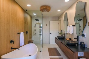 Shower, hair dryer, towels, shampoo