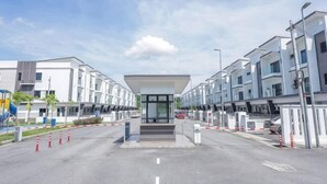 A modern building with a central entrance, multiple floors, and a clear sky. - Airport#F1#KLIA#Mitsui#Transit#INTI#NILAI#SepangF1 (Sepang)