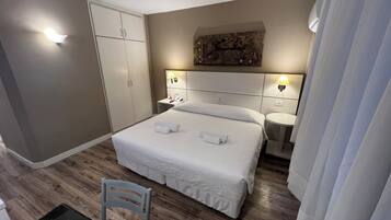 1 quarto, Wi-Fi de cortesia, roupa de cama