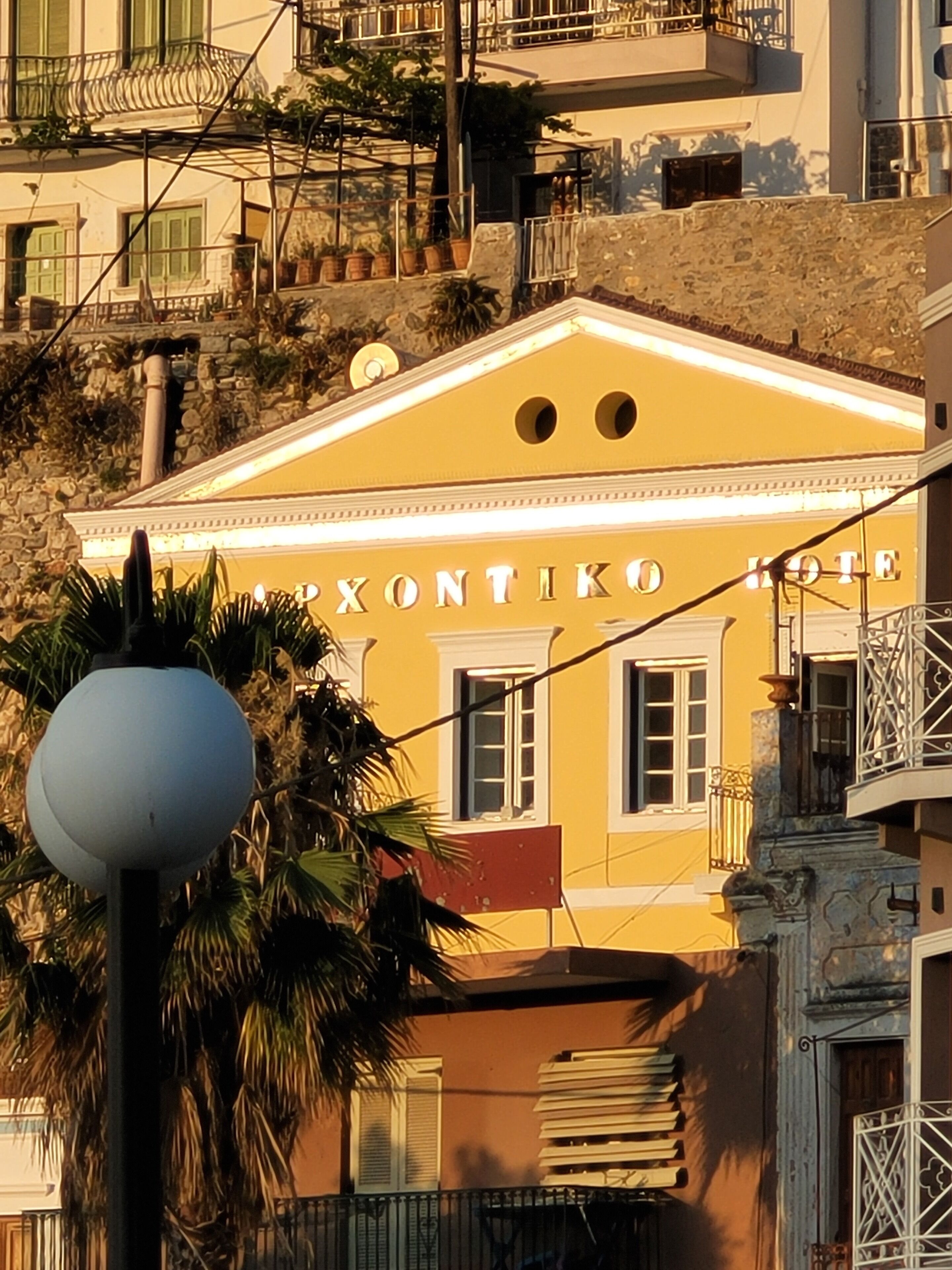 A building with the sign "PAXONTIKO HOTEL" indicating a hotel property.