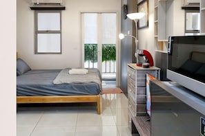 Unclassified image, 4 of 23, button - Cozy & Modern Belmont Apt Studio w/ Wi-Fi &Netflix (West Jakarta)