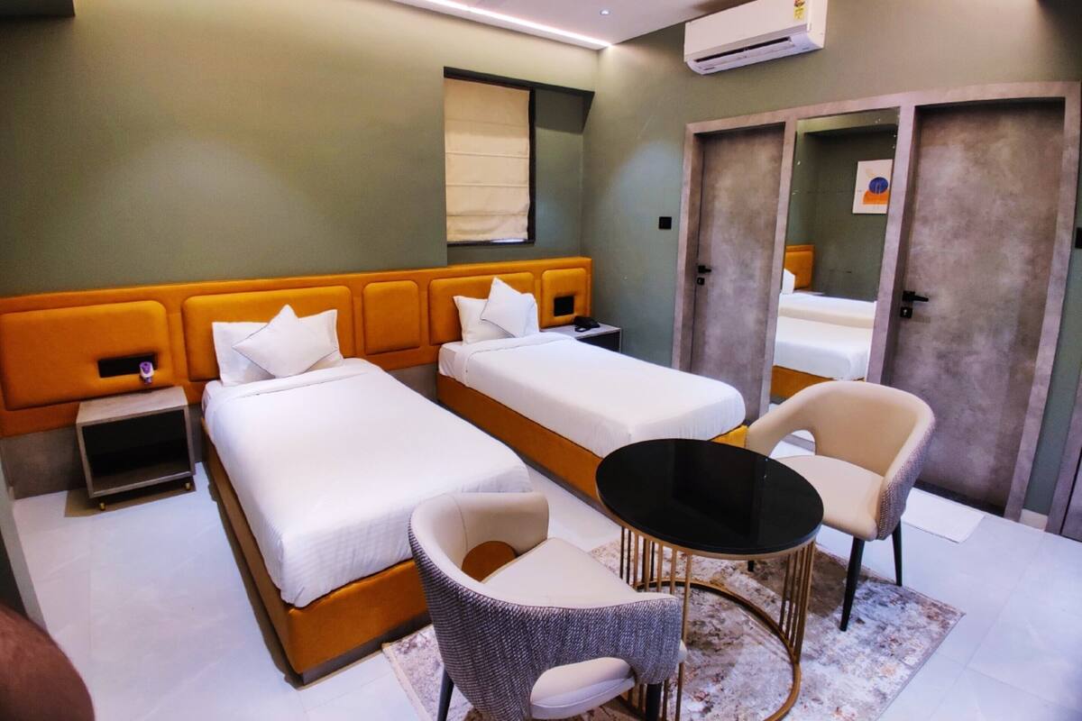 Habitación ejecutiva, vistas a la ciudad | Wifi gratis y ropa de cama