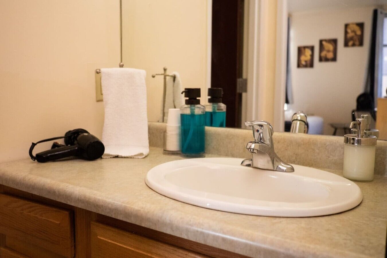 Shower, hair dryer, towels, shampoo